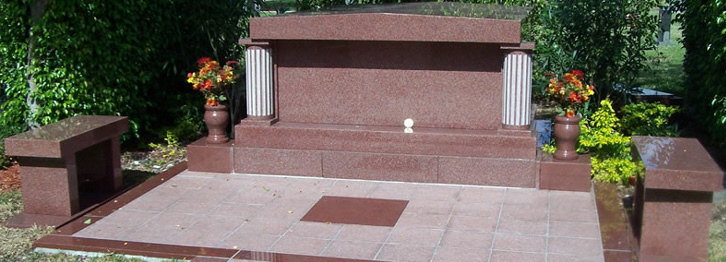 granite mausoleum with patio and benches 